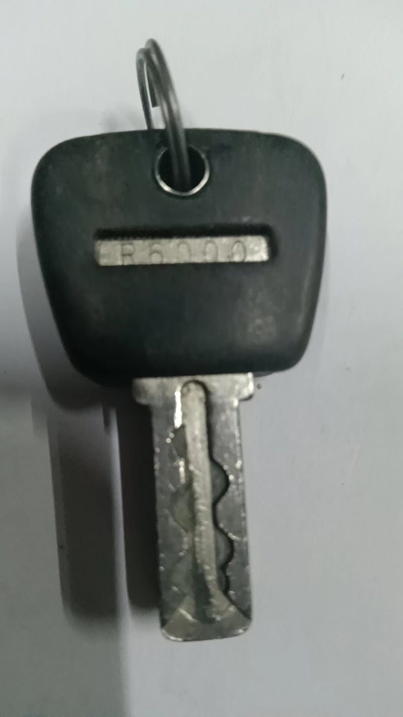 SLOT MACHINE KEY. NUMBER R6000,K1369