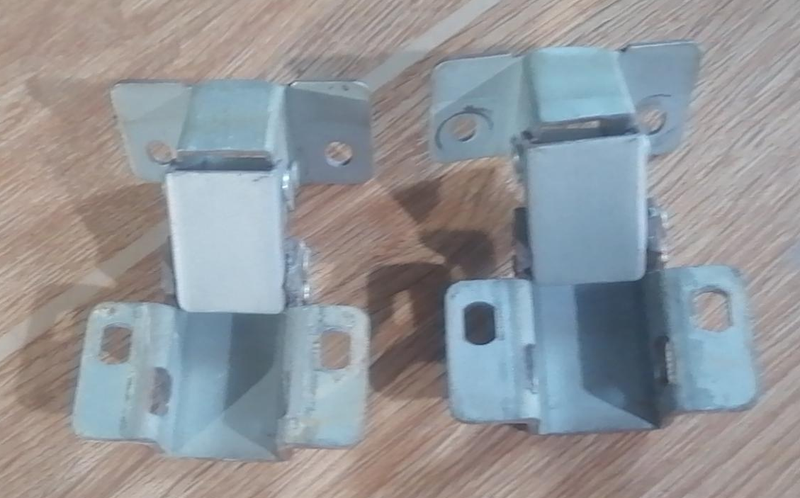 A pair WeChe OK Baby Cabinet Hinges.